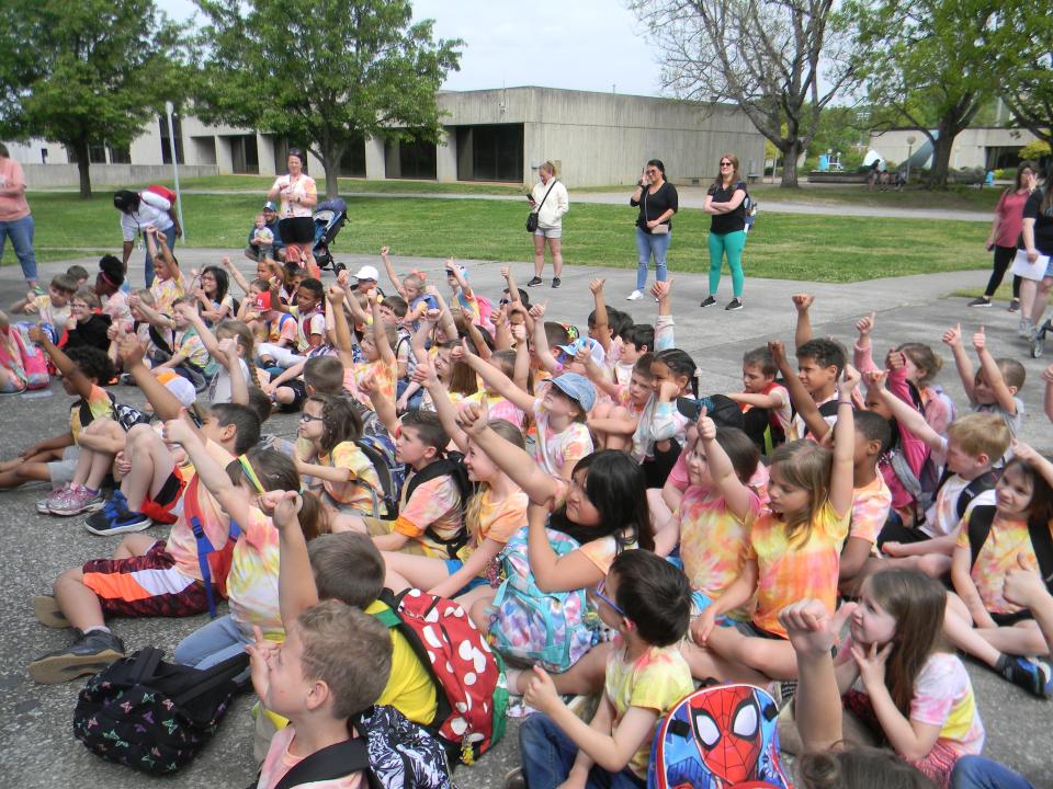 This file photo shows Linden Elementary School students raising their hands at an activity regarding water pollution at A.K. Bissell Park.

Growth on the west end of Oak Ridge could mean changes to Linden Elementary School's future.