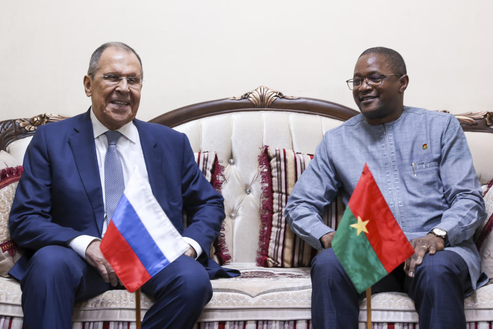 In this photo released by Russian Foreign Ministry Press Service, Russian Foreign Minister Sergey Lavrov, left, and Minister of Foreign Affairs of the Republic of Burkina Faso Karamoko Jean-Marie Traoré smile posing for a photo during their meeting in Ouagadougou, Burkina Faso, Tuesday, June 4, 2024. (Russian Foreign Ministry Press Service via AP)