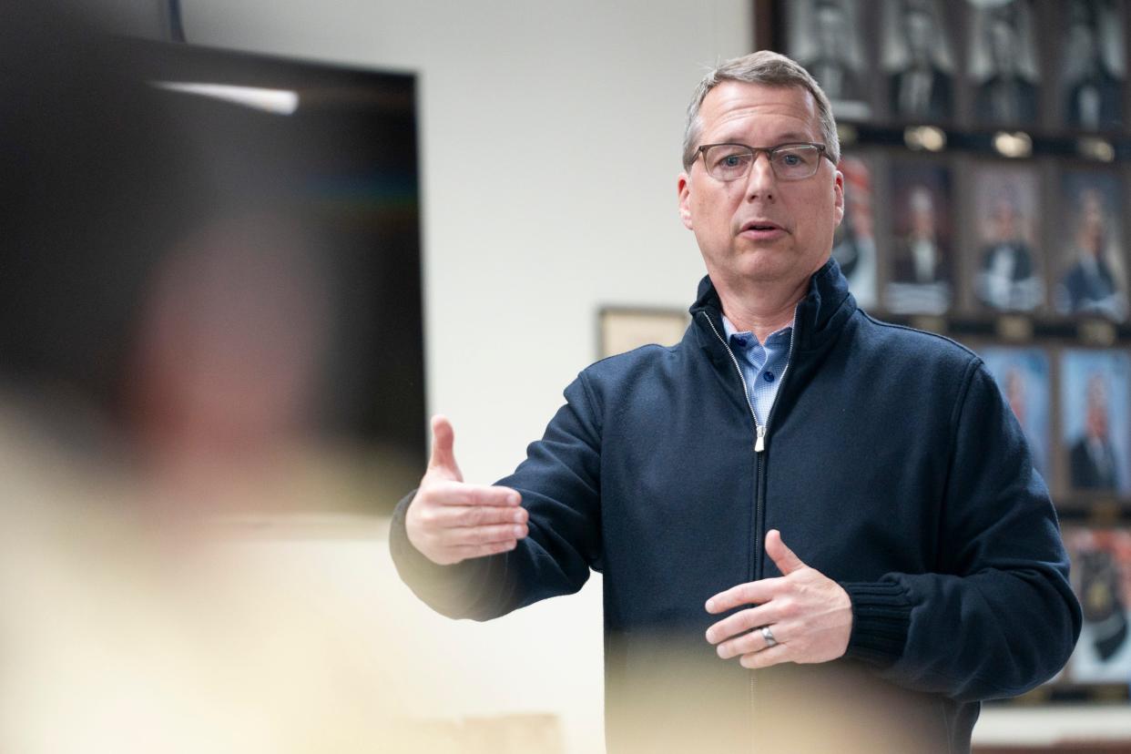 Eric Doden, an Indiana Republican gubernatorial candidate, talks with police officers, Wednesday, April 3, 2024, during a Morgan County Fraternal Order of Police Lodge 119 meeting at the Martin County Shrine Club in Martinsville, Indiana.