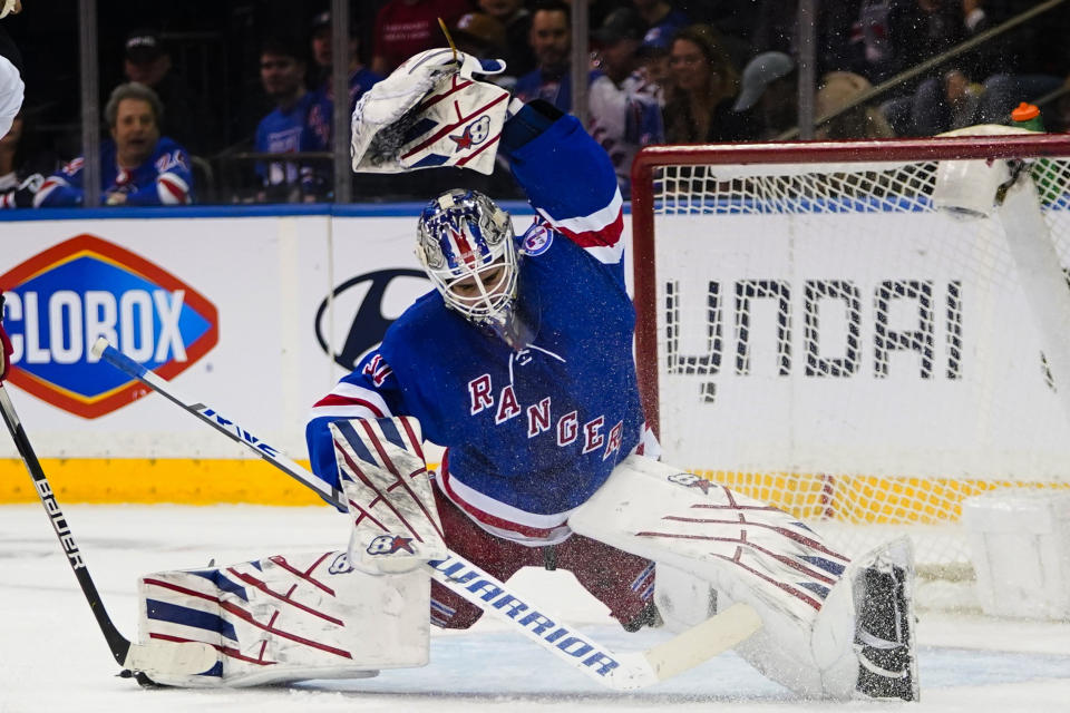 New York Rangers goaltender Igor Shesterkin (31) stops a shot by New Jersey Devils' P.K. Subban during the second period of an NHL hockey game Friday, March 4, 2022, in New York. (AP Photo/Frank Franklin II)