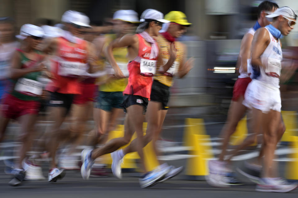 Japan's Satoshi Maruo competes in the men's 50km race walk at the 2020 Summer Olympics, Friday, Aug. 6, 2021, in Sapporo, Japan. (AP Photo/Shuji Kajiyama)