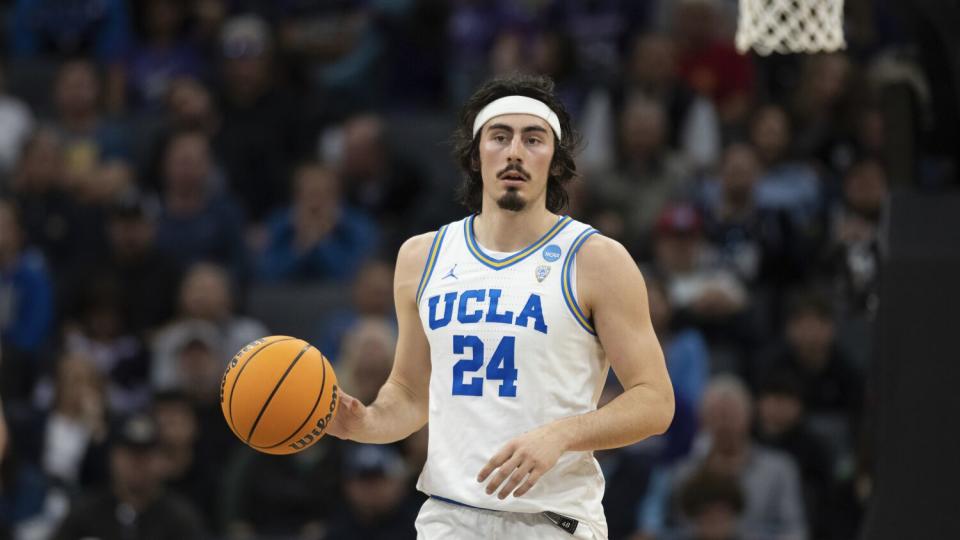 UCLA guard Jaime Jaquez Jr. (24) brings the ball