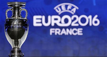 The trophy of the Euro 2016 is seen before the UEFA Euro 2016 qualifying draw in Nice, February 23, 2014. REUTERS/Jean-Paul Pelissier