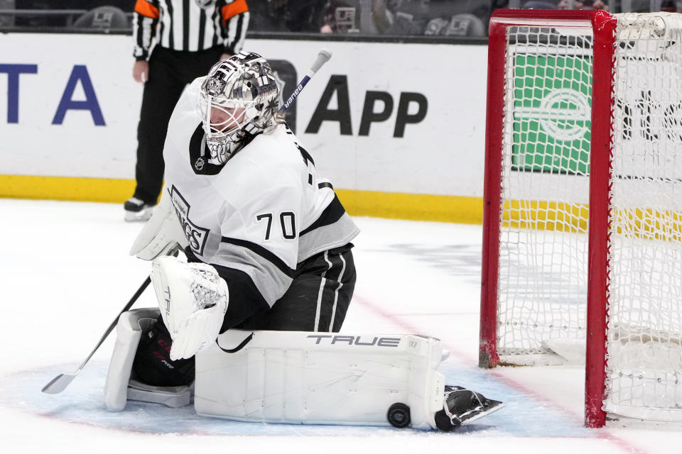 Los Angeles Kings goaltender Joonas Korpisalo (70) stops a shot during the first period of an NHL hockey game against the Winnipeg Jets Saturday, March 25, 2023, in Los Angeles. (AP Photo/Marcio Jose Sanchez)