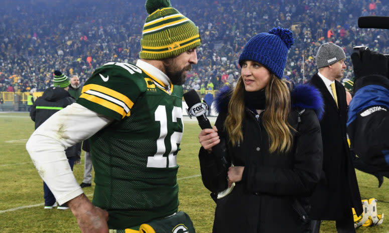 Erin Andrews interviews Aaron Rodgers after a game.