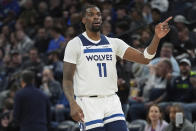 Minnesota Timberwolves center Naz Reid (11) points after making a 3-point shot during the second half of an NBA basketball game against the Toronto Raptors, Wednesday, April 3, 2024, in Minneapolis. (AP Photo/Abbie Parr)