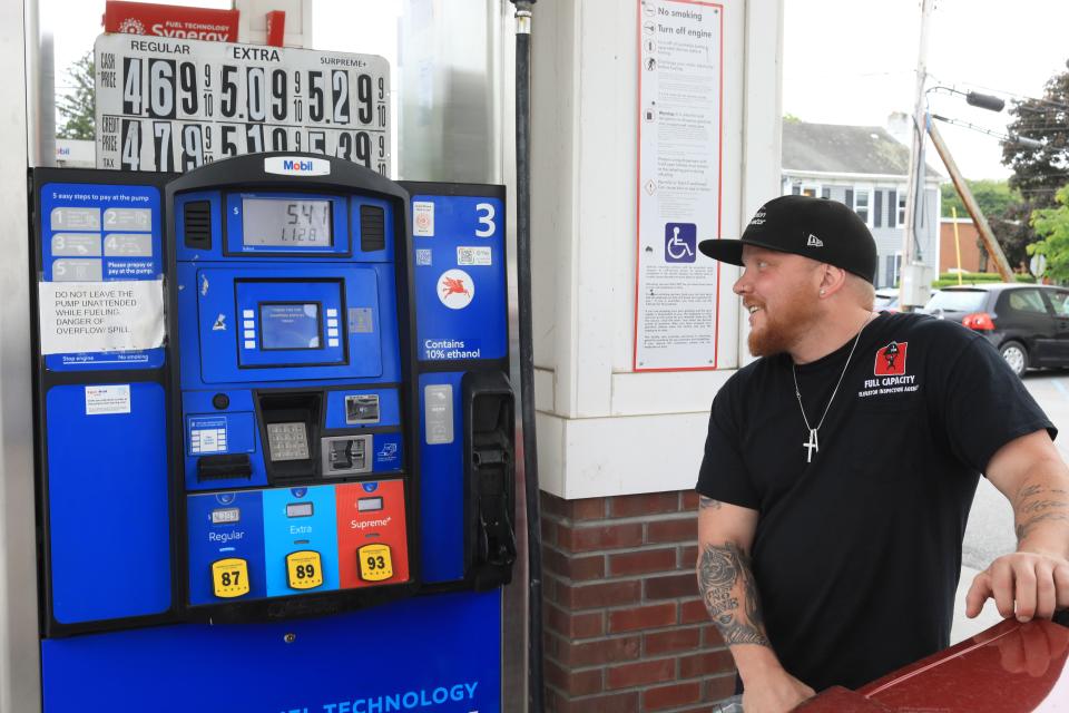 Joel Hanlon of the Town of Poughkeepsie tops off his tank at the Mobil gas station in the Village of Wappingers Falls on June 1, 2022. 