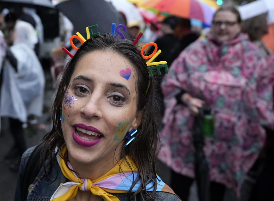 Participants take part in the European LGBTQ pride march in Belgrade, Serbia, Saturday, Sept. 17, 2022. Serbian police have banned Saturday's parade, citing a risk of clashes with far-right activists. (AP Photo/Darko Vojinovic)