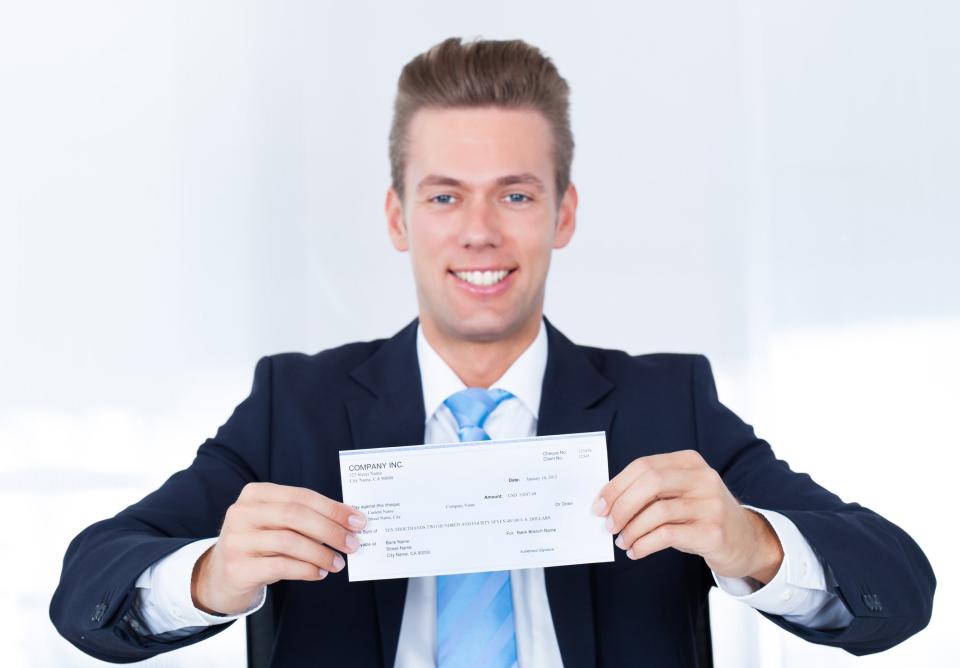 Man holding check