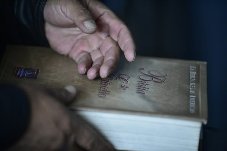 Quechua Indian Gustavo Negrete, evangelical pastor of the Llamahuasi community, speaks with AFP during an interview at his home in Pujili, Ecuador, on June 28, 2015