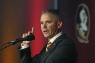 Florida State head football coach Mike Norvell speaks at a news conference Sunday, Dec. 8, 2019, in Tallahassee, Fla. Norvell is Florida State’s new coach, taking over a Seminoles program that has struggled while he was helping to build Memphis into a Group of Five power. (AP Photo/Phil Sears)