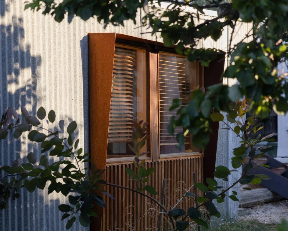 Almo Troup repurposed nearly all of the materials from a tumbledown shack to create a dreamy, minimalist workspace in his backyard.