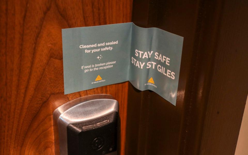 A sealed hotel room door at the St Giles Hotel in west London - PA