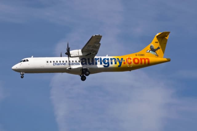 An Aeritalia ATR72 turbo prop airliner of the Channel Islands airline Aurigny air services on final approach