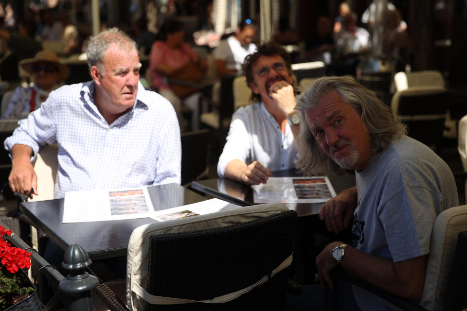 The Grand Tour stars, Jeremy Clarkson, Richard Hammond and James May, sit at a coffee shop on the Main Square in Cracow, Poland, while on tour filming the show. The Grand Tour is a British motoring television series, created by Jeremy Clarkson, Richard Hammond, James May, and Andy Wilman, made for Amazon exclusively for its online streaming service Amazon Prime Video which premiered in 2016. The programme was conceived in the wake of the departure of Clarkson, Hammond, May and Wilman from the BBC series Top Gear. (Photo by Vito Corleone/SOPA Images/LightRocket via Getty Images)