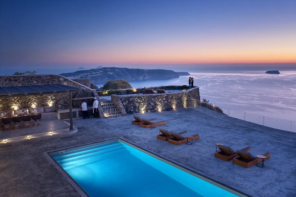 Nighttime lite up Nafsika Villa in Megalohori, Santorini Greece