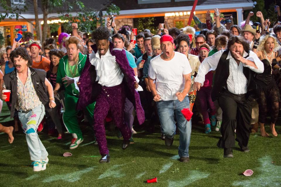 GROWN UPS 2, David Spade (left, vest), Chris Rock (in purple), Adam Sandler (red cap), Kevin James (front right), Maria Bello (right, blonde hair), 2013. ph: Tracy Bennett/©Columbia Pictures/courtesy Everett Collection