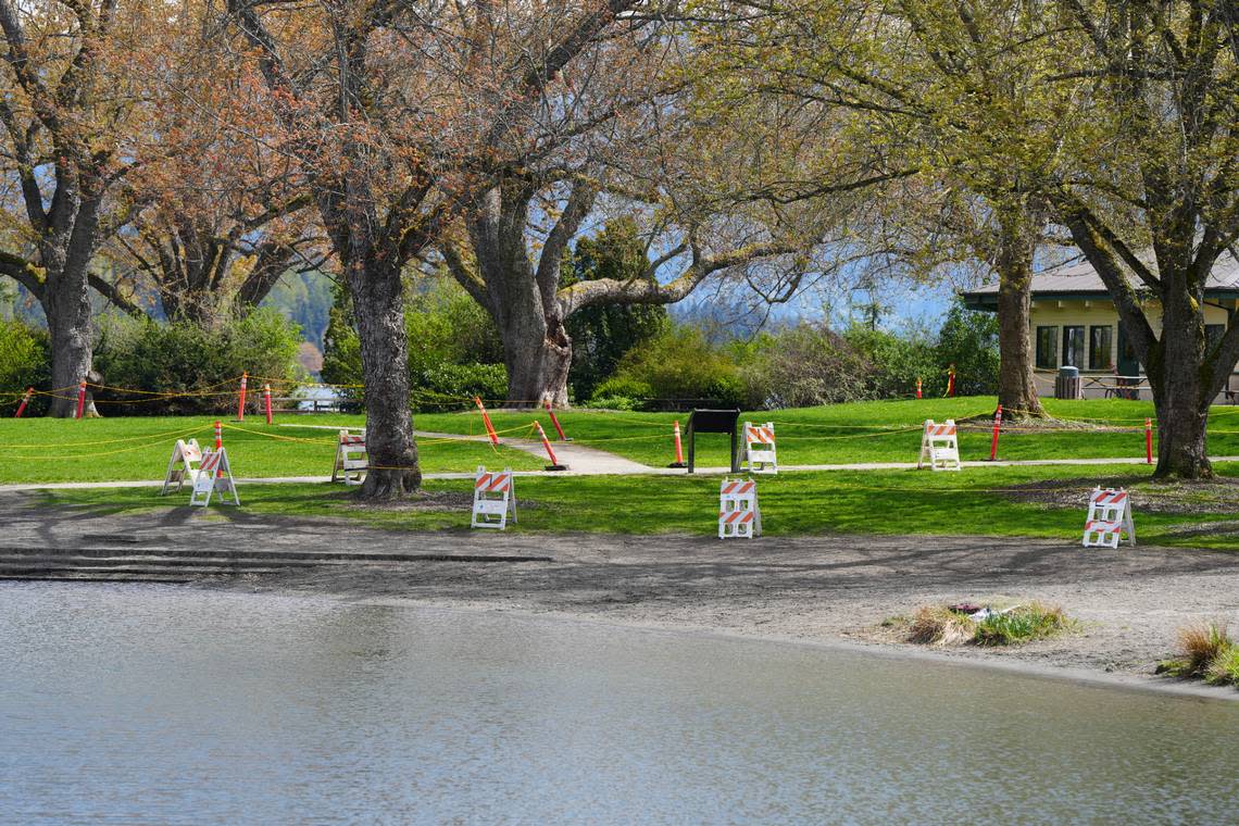 Closure signs and tape mark areas of Bloedel Donovan Park on Lake Whatcom on April 23, 2024, in Bellingham, Wash. Rachel Showalter/The Bellingham Herald