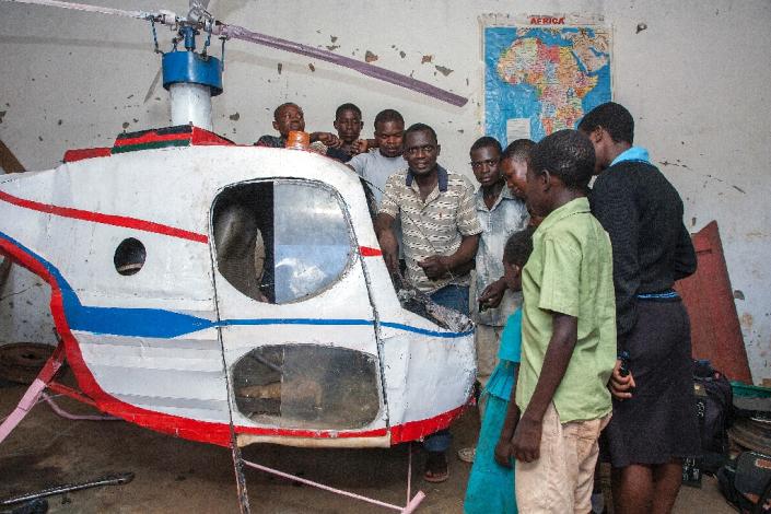 Felix Kambwiri has spent about $350 on the helicopter, including $100 on its converted motorbike engine (AFP Photo/Amos Gumulira)