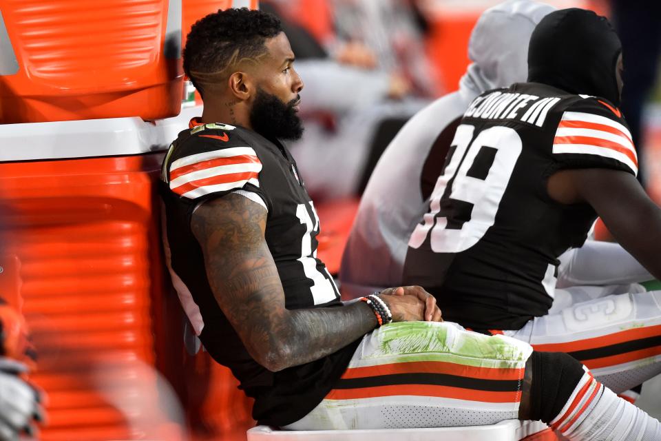 Cleveland Browns wide receiver Odell Beckham Jr. sits on the bench during the second half of an NFL football game against the Arizona Cardinals, Sunday, Oct. 17, 2021, in Cleveland. (AP Photo/David Richard)