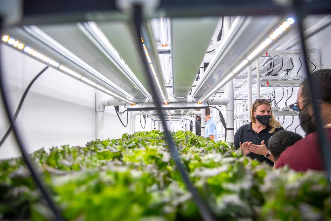 Mollie McKinney, AppHarvest ag tech program coordinator, gives a tour of AppHarvest’s first container farm in an urban location, located at Carter G. Woodson Academy in Lexington, Ky., on Friday, Sept. 17, 2021.