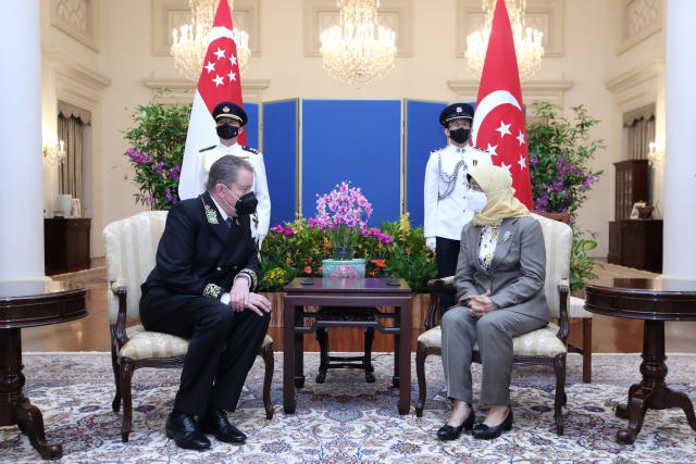 Russia's ambassador to Singapore Nikolay Kudashev and Singapore President Halimah Yacob speaking at the Istana on 19 April 2022. (PHOTO: Ministry of Communications and Information)