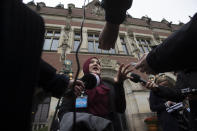 Yasmin Ullah of the Rohingya community is interviewed outside the International Court in The Hague, Netherlands, Thursday, Jan. 23, 2020, after the court ordered Myanmar take all measures in its power to prevent genocide against the Rohingya. The United Nations' top cour issued a decision on a request by Gambia. (AP Photo/Peter Dejong)