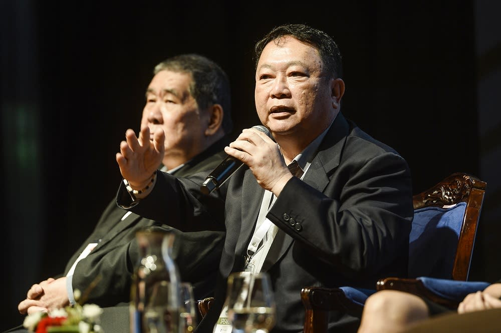 Malay Mail editor-in-chief Datuk Wong Sai Wan speaks at the inaugural WOWComm 2019 sustainability conference at the Putrajaya Marriott Hotel December 5, 2019. — Picture by Miera Zulyana