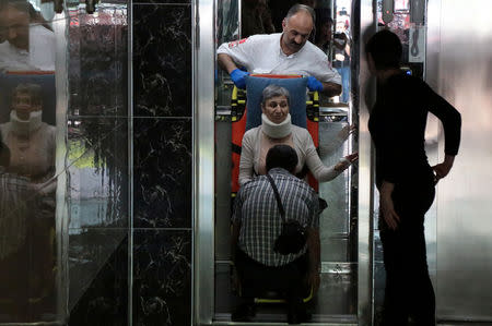 Pro-Kurdish Peoples' Democratic Party (HDP) lawmaker Leyla Guven, who ends her hunger strike after a call from jailed militant leader Abdullah Ocalan, leaves her home to go to hospital in Diyarbakir, Turkey, May 26, 2019. REUTERS/Sertac Kayar