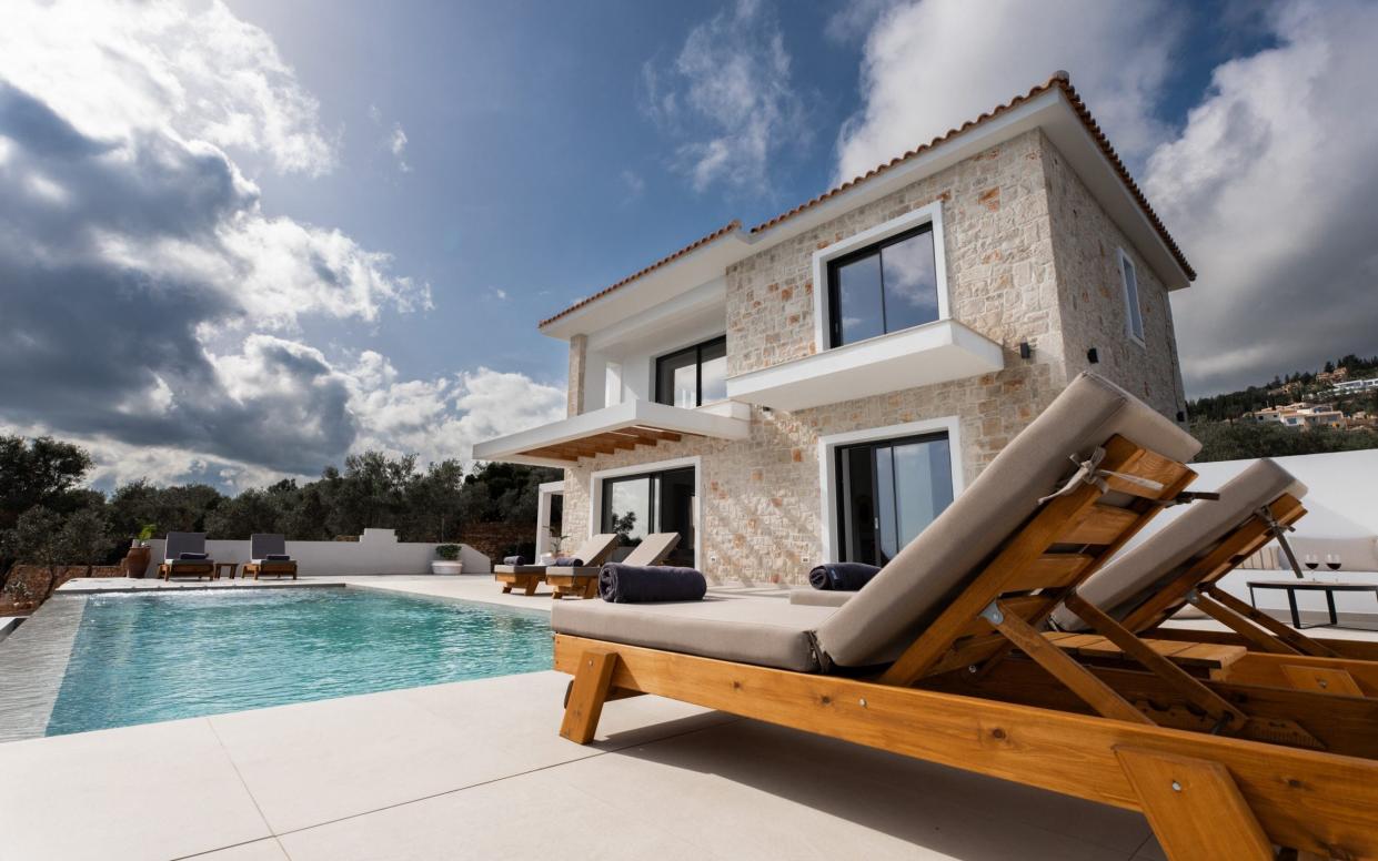 Deckchair next to a swimming pool