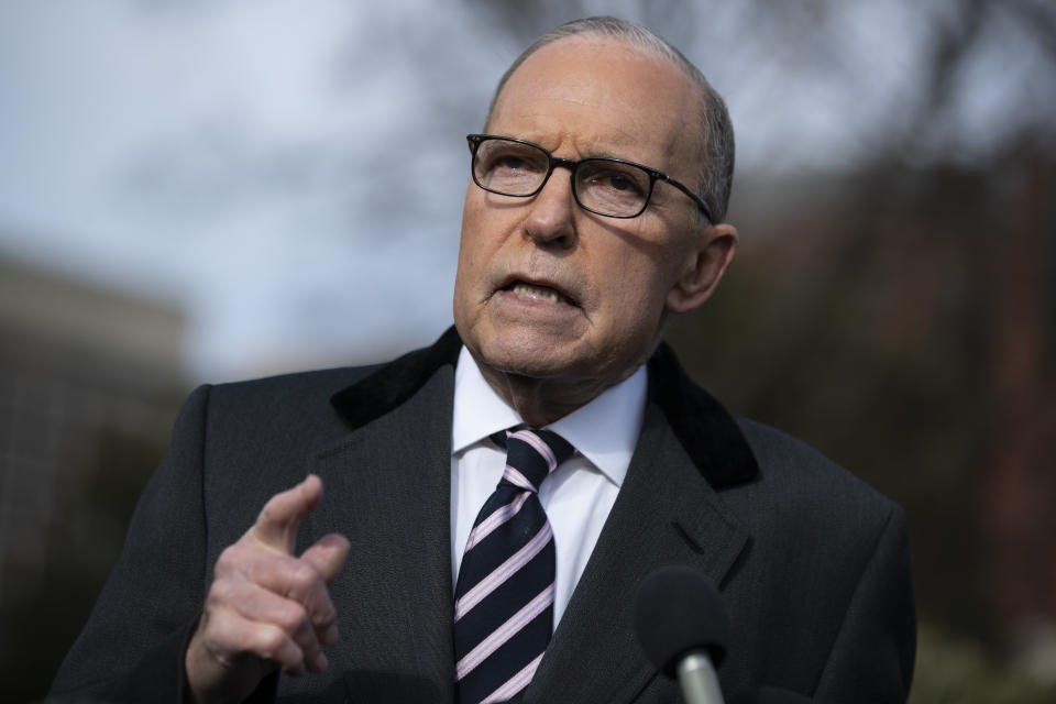 White House chief economic adviser Larry Kudlow talks with reporters outside the White House, Friday, Dec. 6, 2019, in Washington. (AP Photo/ Evan Vucci)