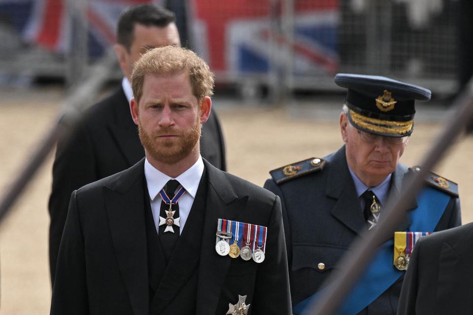 Prince Harry, Duke of Sussex, follows the coffin of Queen Elizabeth II.