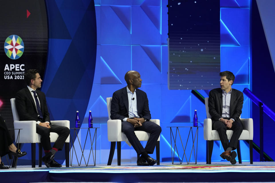 From left; Chris Cox, CPO, Meta, James Manyika, SVP of Research, Technology & Society, Google, and Sam Altman, CEO, OpenAI, participate in a discussion entitled "Charting the Path Forward: The Future of Artificial Intelligence" during the Asia-Pacific Economic Cooperation (APEC) CEO Summit Thursday, Nov. 16, 2023, in San Francisco. (AP Photo/Eric Risberg)