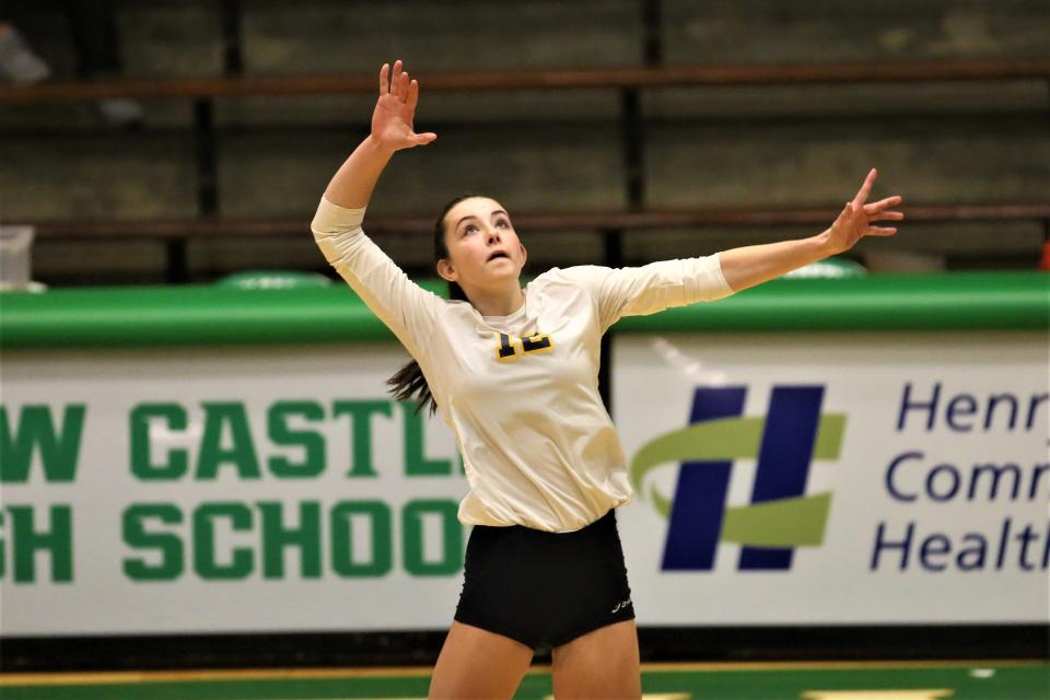 Delta volleyball's Emily Reno skies for a kill in the team's sectional first round match against New Castle at New Castle High School on Thursday, Oct. 13, 2022.