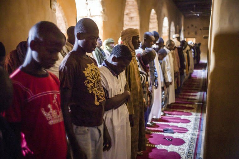 People pray at the Djingareyber mosque in Timbuktu on February 1, 2013