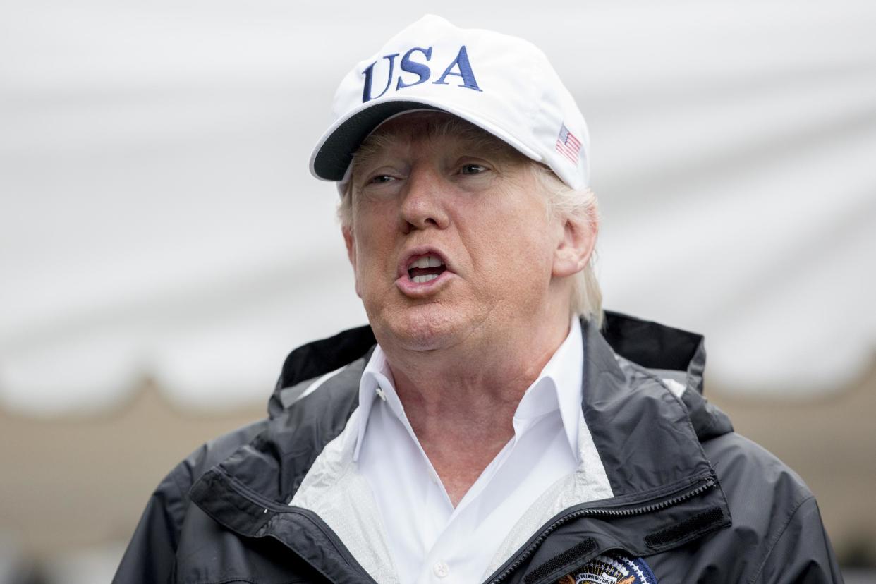 President Donald Trump speaks to members of the media before boarding Marine One: AP