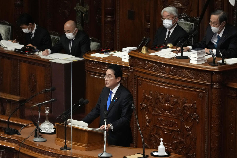 Japanese Prime Minister Fumio Kishida, bottom, delivers a speech during a Diet session at the lower house of parliament Monday, Jan. 23, 2023, in Tokyo. (AP Photo/Eugene Hoshiko)