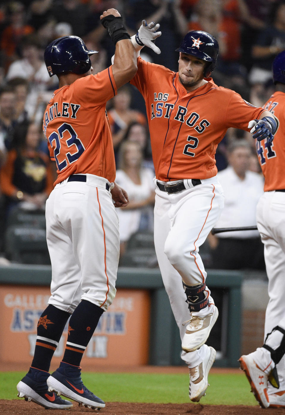 Houston Astros' Alex Bregman (2) celebrates his two-run home run off Los Angeles Angels relief pitcher Miguel Del Pozo with Michael Brantley during the fifth inning of a baseball game Sunday, Sept. 22, 2019, in Houston. (AP Photo/Eric Christian Smith)