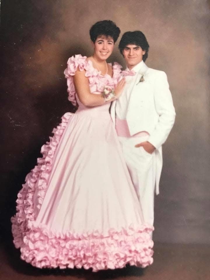 Kellie Farrar, who now lives in Sandwich, at her junior prom in 1986 with her "Gone With the Wind" gown and her gentleman caller who stepped in when her date cancelled two days before. He even found a pink cumberbund.