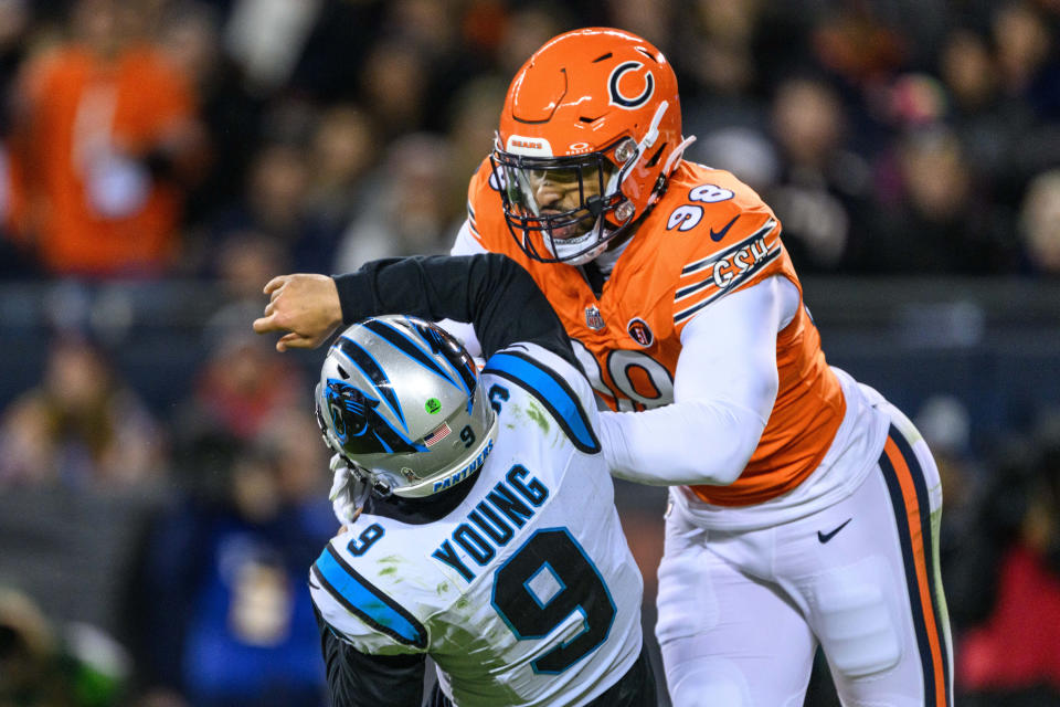 Chicago Bears defensive end Montez Sweat (98) hits Carolina Panthers quarterback Bryce Young (9). Mandatory Credit: Daniel Bartel-USA TODAY Sports