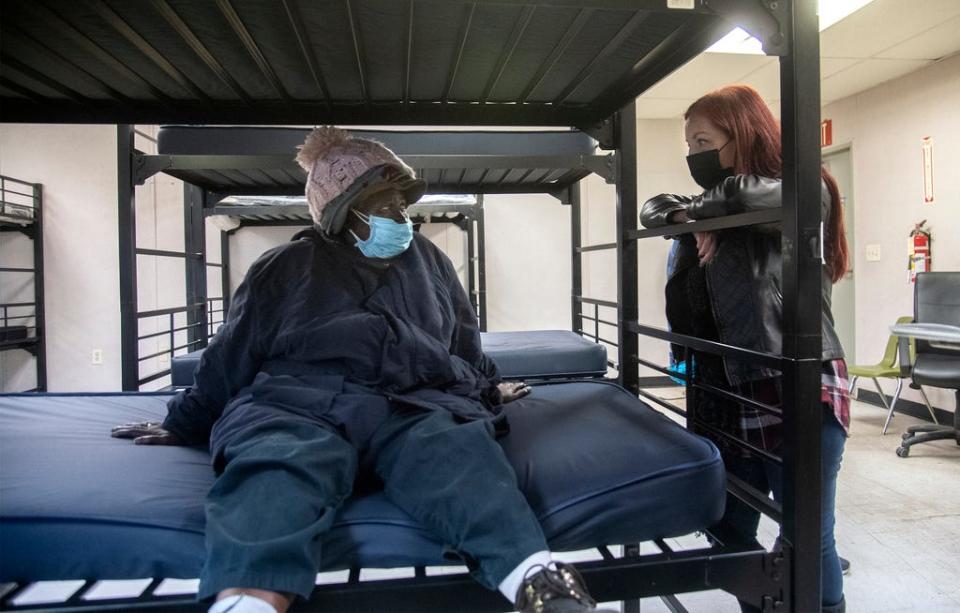 Stockton Shelter for the Homeless' CEO JoLyn McMillan, right, talks with Antoinette Wilkerson who is first occupant of the shelter's new low-barrier women's shelter in Stockton.