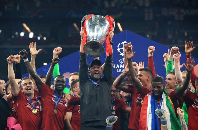 Liverpool manager Jurgen Klopp lifts the Champions League trophy
