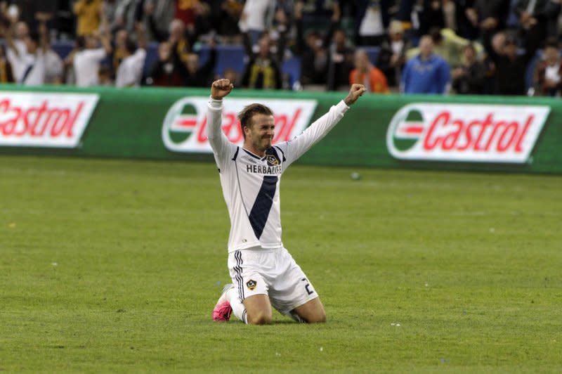 David Beckham celebrates in the final moments as the Los Angeles Galaxy defeated the Houston Dynamo 3-1in the MLS Cup on December 1, 2012. Less than 6 months later, on May 16, 2013, Beckham announced he would retire from soccer. Photo by Jonathan Alcorn/UPI