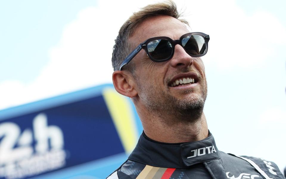 Jenson Button of Great Britain and Hertz Team Jota Porsche attends the drivers group photo during previews for the 24 Hours of Le Mans