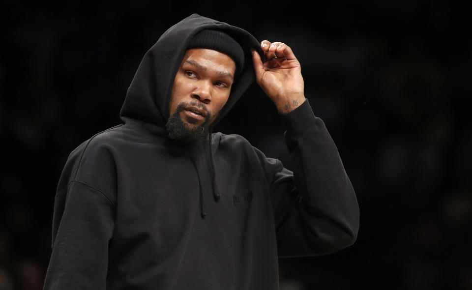 NEW YORK, NEW YORK - JANUARY 30: (NEW YORK DAILIES OUT)  Kevin Durant #7 of the Brooklyn Nets looks on against the Los Angeles Lakers at Barclays Center on January 30, 2023 in New York City. The Nets defeated the Lakers 121-104. NOTE TO USER: User expressly acknowledges and agrees that, by downloading and or using this photograph, User is consenting to the terms and conditions of the Getty Images License Agreement. (Photo by Jim McIsaac/Getty Images)