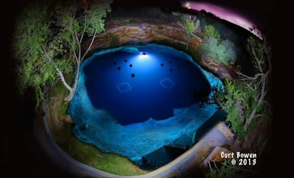 A photograph of the Blue Hole, in Santa Rosa, N.M., at night in mid-September, 2013. Efforts to explore the lake's cave have been thwarted by a boulder blocking the entrance.