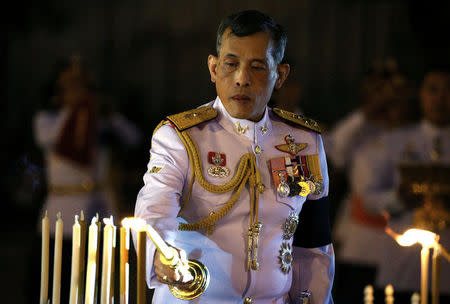 Thailand's Crown Prince Maha Vajiralongkorn attends an event commemorating the death of King Chulalongkorn, known as King Rama V, as he joins people during the mourning of his father, the late King Bhumibol Adulyadej, at the Royal Plaza in Bangkok, Thailand, October 23, 2016. REUTERS/Athit Perawongmetha