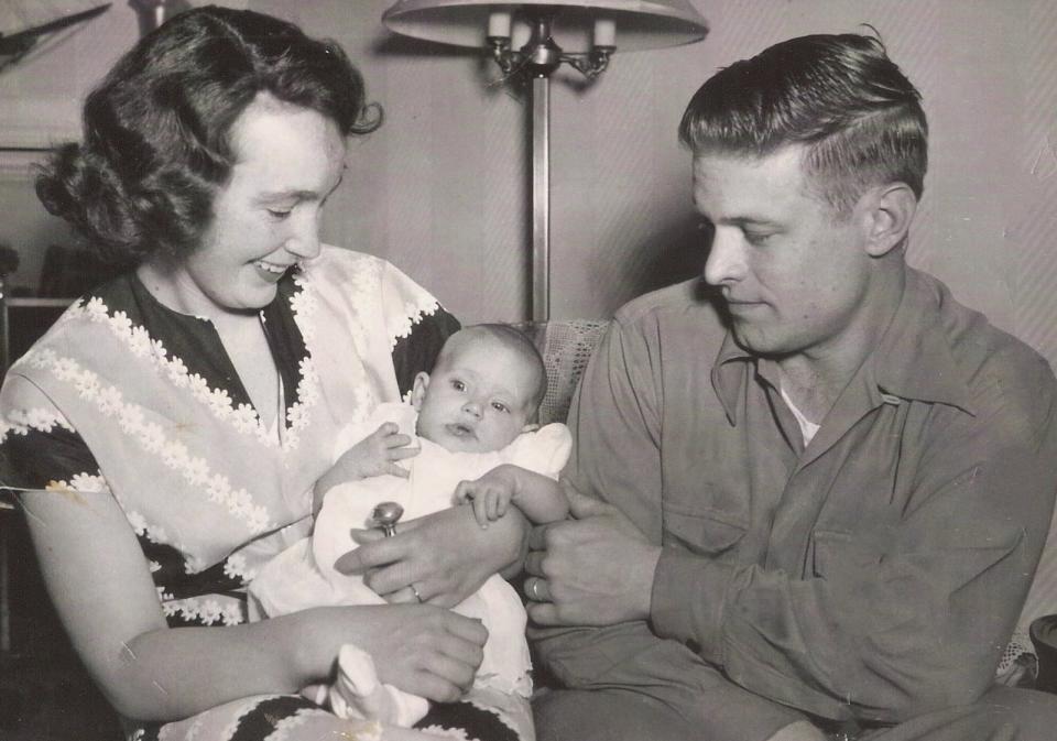 Merrill and Polly Leavens of Squantum with their first-born child, Debby, in 1950.