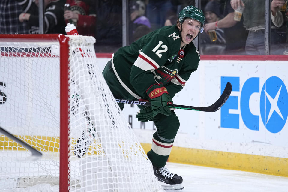 Minnesota Wild left wing Matt Boldy (12) celebrates after scoring a goal against the Philadelphia Flyers during the third period of an NHL hockey game Thursday, Jan. 26, 2023, in St. Paul, Minn. (AP Photo/Abbie Parr)