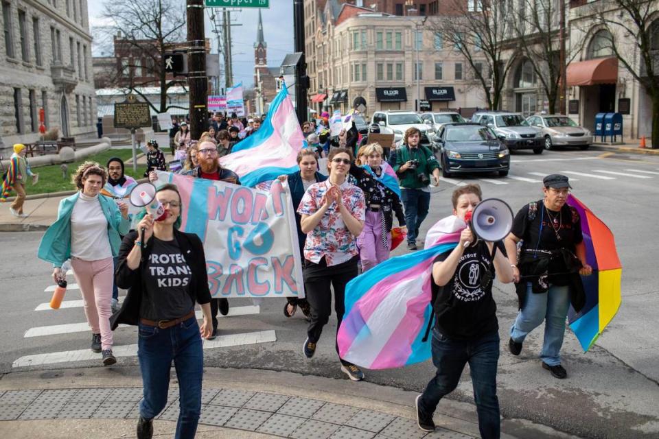 People gather for a rally organized by LGBTQ youth and adults in opposition to Senate Bill 150 and also to celebrate Trans Day of Visibility in Lexington, Ky., Friday, March 31, 2022.